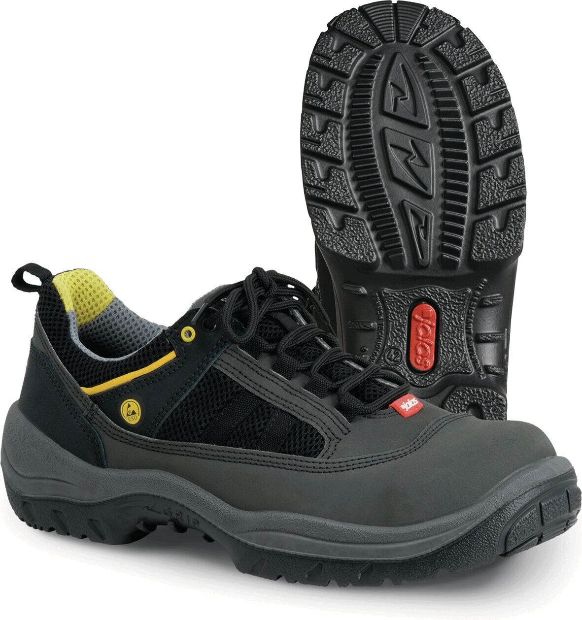 The image shows a pair of black sports shoes with yellow and gray accents. The sole is grippy and heavily treaded, ideal for outdoor activities. The shoe has a laced front.