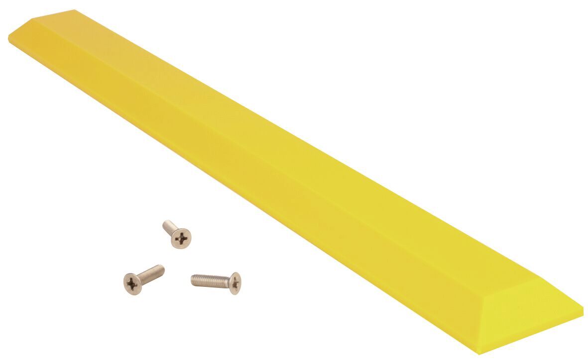 The image shows a long, yellow, trapezoidal plastic block. Next to it are three small, silver screws. The block could be part of an assembly system.