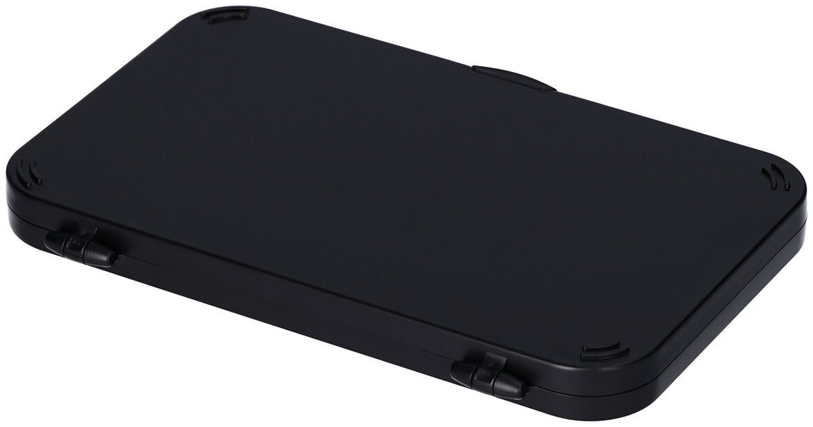 The image shows a black, flat, and rectangular box. It has rounded corners and two small flaps on the sides. The surface is smooth and matte.