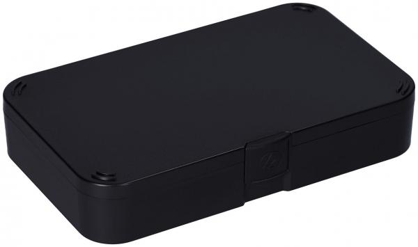 The image displays a rectangular, black box. It has rounded corners and a flat top. On one side, there is a small latch or clip. The box appears sturdy and inconspicuous.