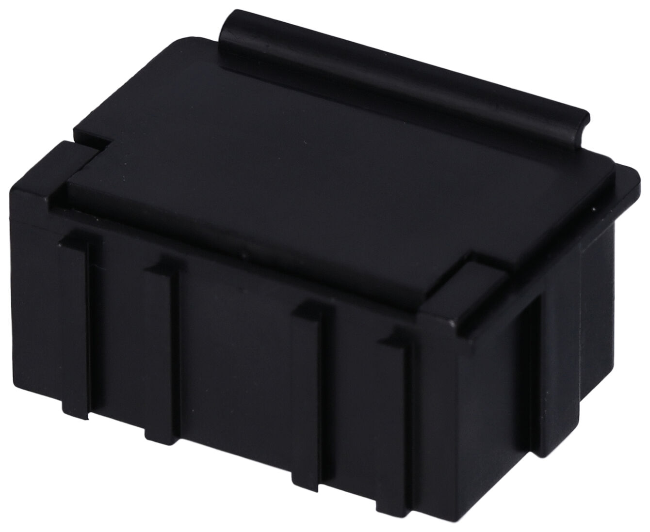 The image shows a small, black plastic box with a rectangular shape. It has a slightly raised flap and vertical ridges on the sides for better grip.