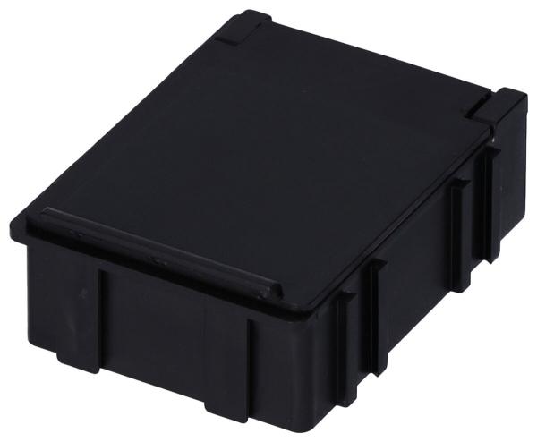 The image shows a black, rectangular box with rounded corners. It has a slightly raised lid and four small feet on the bottom.