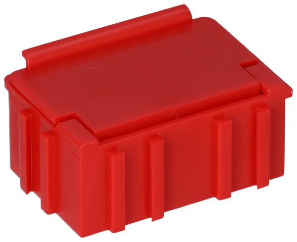 It is a small, rectangular box in bright red. The box has a flat top and is adorned with vertical grooves on the sides. It appears sturdy and stable.