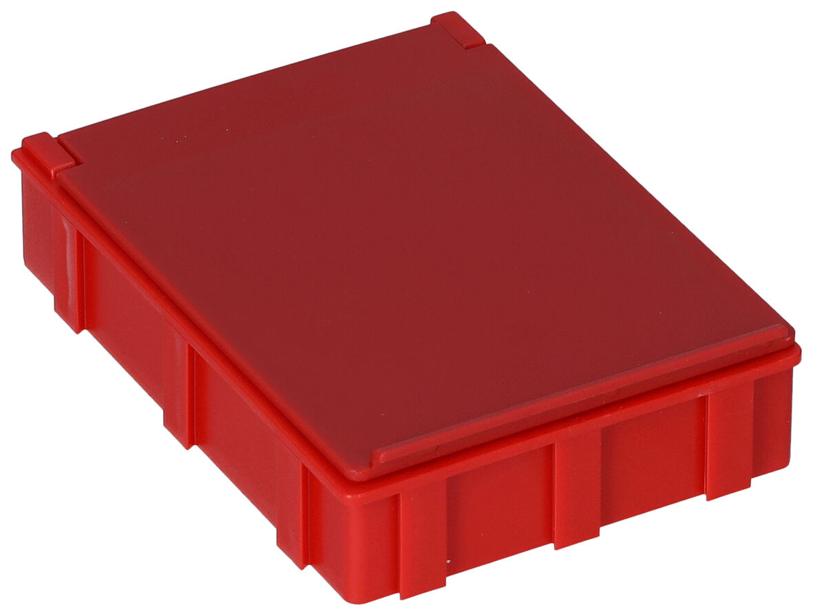 The image shows a red, rectangular box. It has a flat lid and is made of plastic. The surface is smooth, and the edges are slightly flattened. The box has side indentations for better grip.