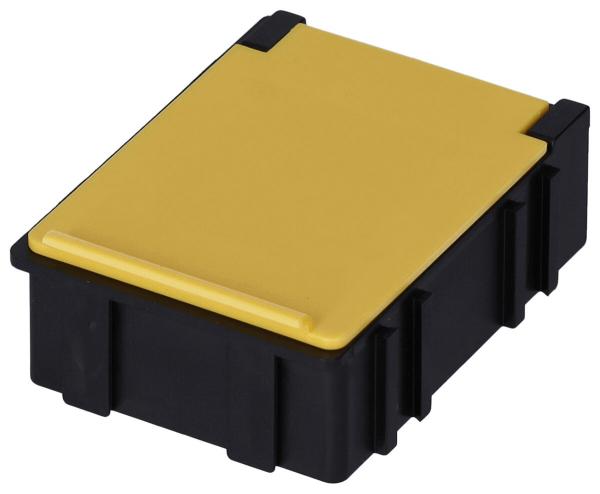 The image shows a rectangular box with a black bottom and a yellow lid. The corners are rounded, and the box has a flat surface with a slight elevation on the top.