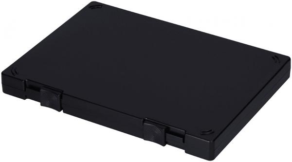 The image shows a flat, rectangular black box with rounded corners. It has small clips or clasps on two sides for opening and closing. The surface is smooth.