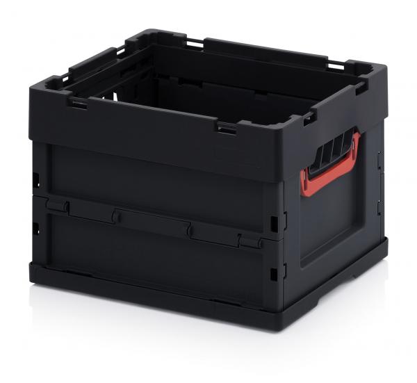 This is a black, rectangular plastic transport box. It has open sides and handles in bright red, which facilitate carrying.