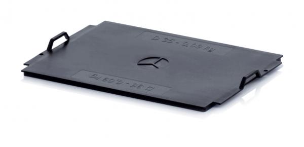 The image displays a black, rectangular, flat cover with two side handles. It has a smooth surface and is possibly made of plastic. There is a symbol incorporated on one side.