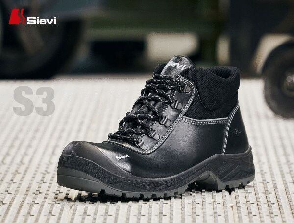 The image shows a black protective shoe with high shafts, laces, and a non-slip sole. It has a sporty shape and is suitable for work purposes.