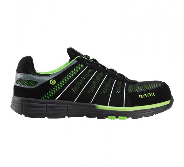 The shoe is sporty, predominantly black with green and silver accents. It features a breathable mesh upper, flat laces, and a non-slip sole.