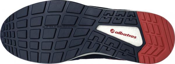 The image displays the underside of a shoe with a textured tread. The sole is primarily black, features a red insert, and a white area with the "albatros" logo.