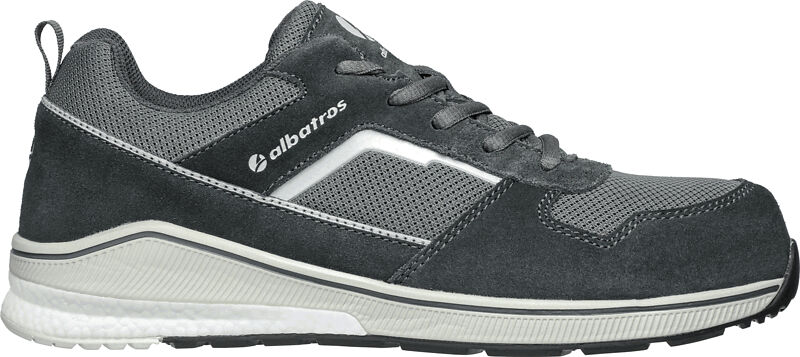 The shoe is sporty and slim cut. It is made of gray mesh and suede. The sole is white with a textured surface. The shoe has lacing and a padded heel.