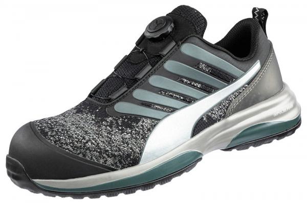 The shoe is a modern sports shoe in black and gray with reflective elements. It has a special lacing system and a sturdy, non-slip sole. Comfortably padded.