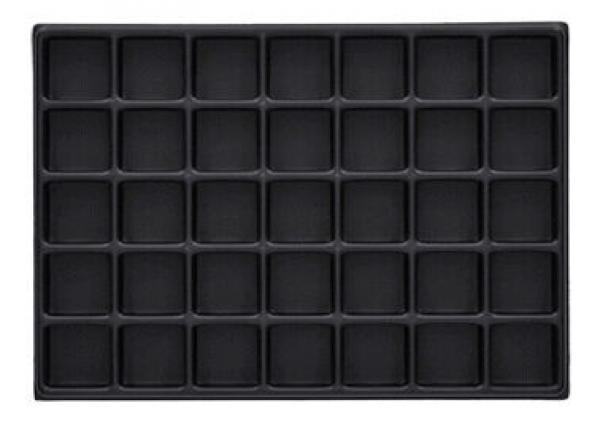 The image shows a black baking tray with 30 small, rectangular compartments in five rows and six columns. Each compartment is uniform and has a smooth surface.