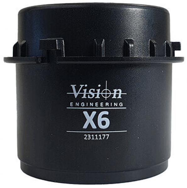 The image shows a black, cylindrical container with a smooth surface. On the front, the words "Vision Engineering" and "X6" are printed in white lettering.