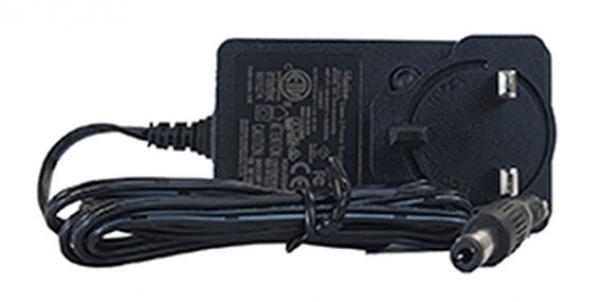 The image displays a black power adapter with two plugs on one side and a cable leading to a round connector. It is used for charging devices.