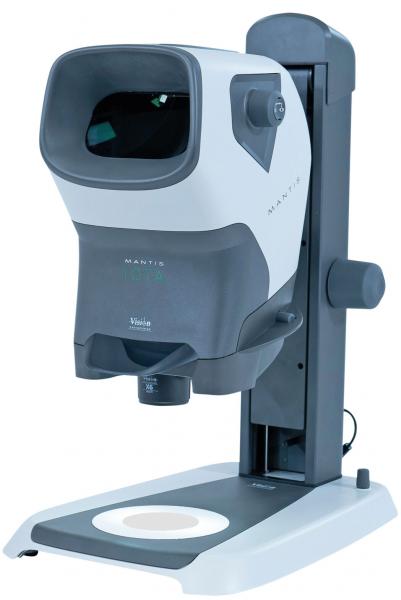 The image displays a medical device for eye examination. It features an oval opening at the front and a stable base. The colors are primarily gray and white, with a modern design.