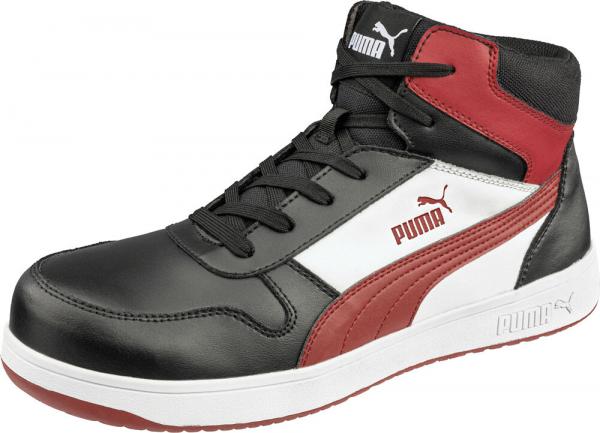 The shoe is a mid-top sneaker with a black leather upper. It features red and white accents and a sturdy, white sole. Laces and the Puma logo are also visible.