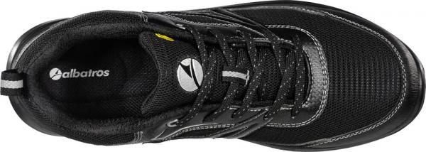 The image shows a black sports or casual shoe made from breathable material. It features a lace-up front, a cushioned sole, and a simple, modern design.