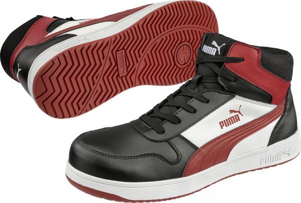 The image shows a pair of sporty, black high-top sneakers with red and white accents. They feature a padded collar and a grippy, non-slip sole.