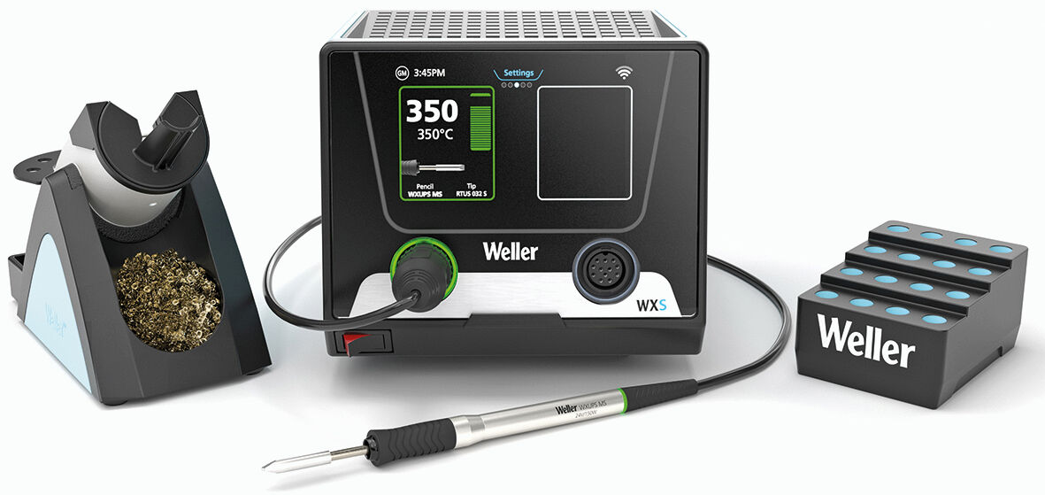 The image shows a soldering station with a main unit, a soldering iron, and a holder for soldering material. The device has a digital display that shows the temperature. Next to it are three soldering tips.