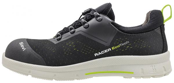 The shoe is black with gray and green accents. It has a breathable upper, a cushioned sole, and innovative lacing. Sporty and modern in shape.