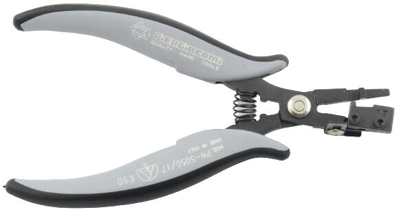 The image shows a pair of pliers with gray, non-slip handles and a spring-assisted opening. The pliers feature a mechanism at the tip for gripping or cutting objects.