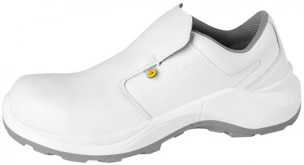 The shoe is white, closed, and has a smooth surface. It features a wider sole and an elastic insert on the side for easy slipping on and off.