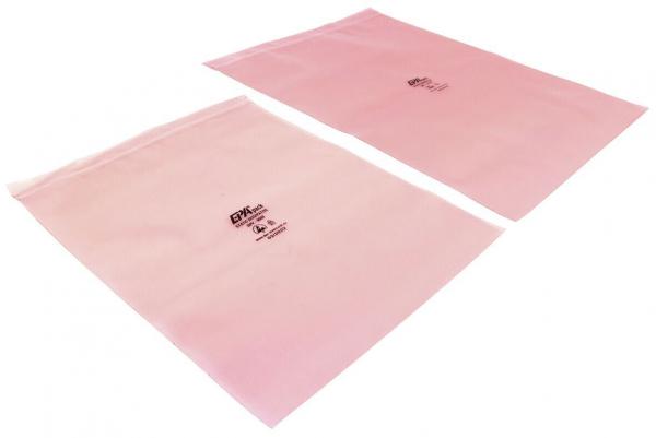 Two transparent, pink bags are lying next to each other. They have a sealable top edge. Each bag features a black print with logos and information.