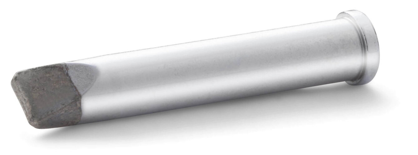 The image shows an elongated, silver metal cylinder with a flattened, hexagonal tip. The body is smooth, without visible patterns or handles.