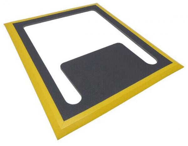 The image displays a rectangular frame with a yellow border and a dark interior. In the center, there are two small cutouts that resemble the shape of a cup or a container.