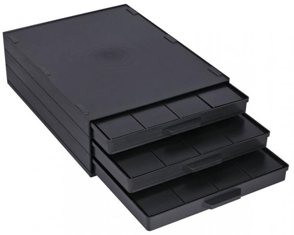 The image shows a black storage box with multiple drawers. There are three drawers that are partially pulled out, and the surface is smooth and rectangular.