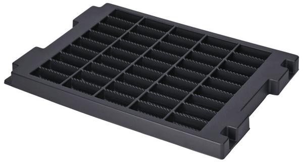 The image shows a rectangular, flat object in black. It has many small indentations arranged in a grid pattern. It appears sturdy and has small protrusions on the sides.