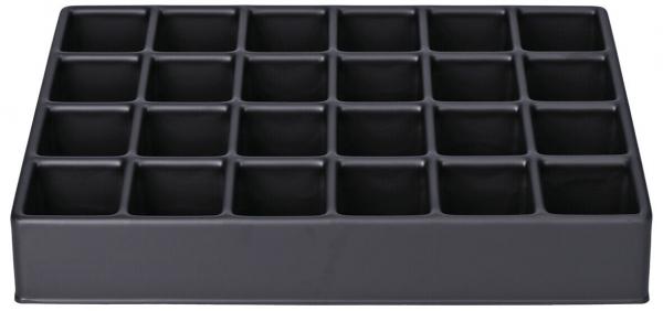 The image shows a rectangular, flat, black box with 24 uniform compartments, arranged in four rows and six columns. The compartments are square and open.