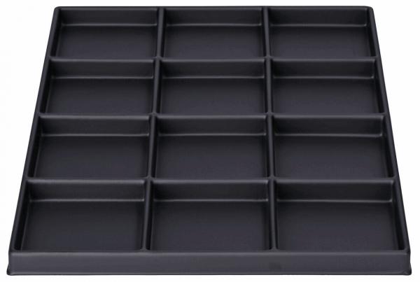 The image shows a black tray with 15 recessed compartments in a uniform arrangement. It has a rectangular frame and is flat. The compartments are well-suited for storing small items.