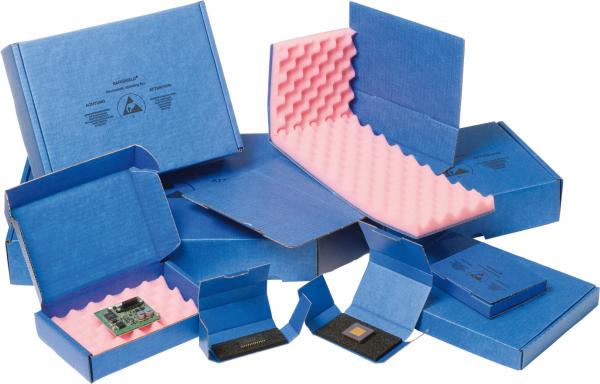 The image shows several blue boxes, some of which are open. Inside the boxes are pink foam inserts for protecting sensitive items, possibly electronics.