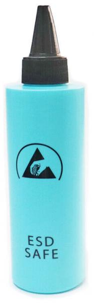 The image shows a turquoise bottle with a black cap. On the bottle, in capital letters, it reads "ESD SAFE" and features a symbolic logo in the shape of mountains.