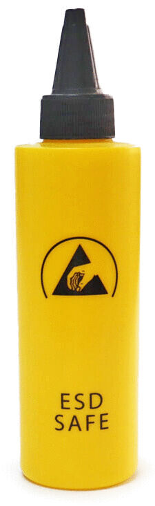 The image shows a yellow bottle with a black cap attached. The bottle reads "ESD SAFE" and features a symbol with a triangle. It is designed to protect against electrostatic discharge.