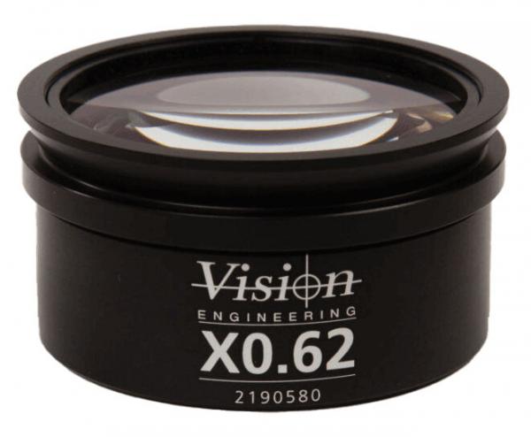 The image shows a round, black lens with a smooth surface. On the front it reads "Vision Engineering" and the numbers "X0.62" and "2190580" are printed.