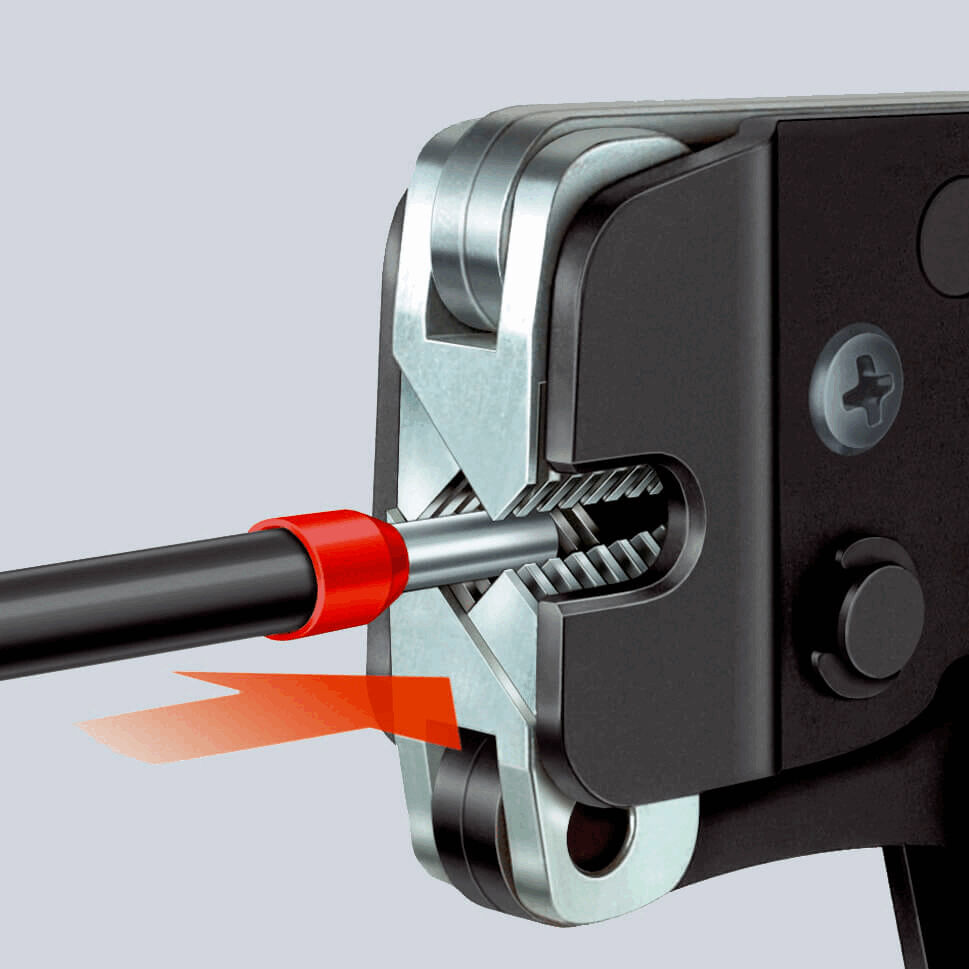 The image shows a detailed view of a tool. A black casing with metallic elements and a red-marked screw is depicted. Additionally, a cable is visible that is inserted into the tool.