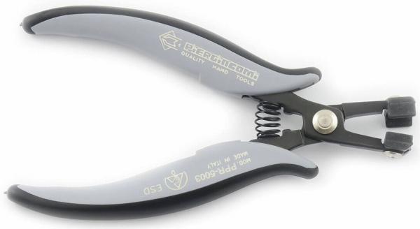 The image shows a pair of pliers with gray handles and a metal tip. The handles are ergonomically shaped and feature a spring that facilitates opening.