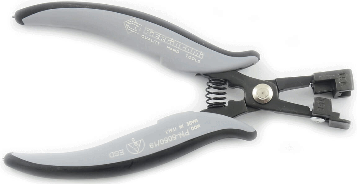 The image shows a pair of pliers with gray, rubberized handles and a black metal tip. It features a spring-loaded opening and is designed for precise gripping or cutting.