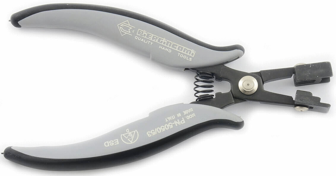 This is a pair of pliers with gray, ergonomic handles and a spring-loaded opening. The head has a sharp edge for cutting. Ideal for precise work.