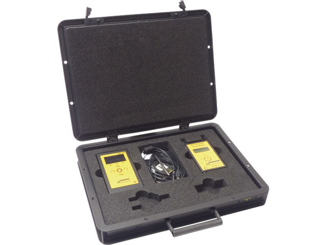 The image shows a black suitcase that is open. Inside, there are two yellow devices and a cable, surrounded by foam padding for protection and support.