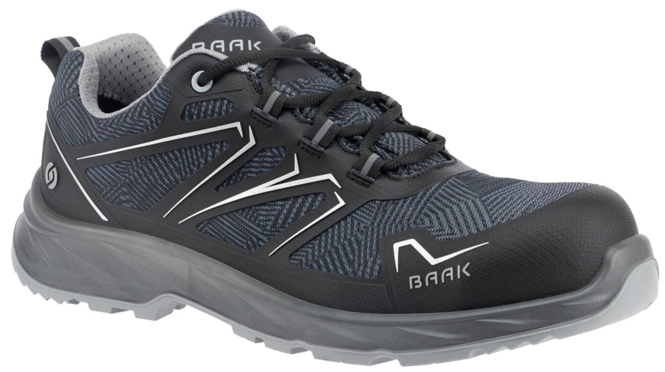 The shoe is a sporty safety shoe in dark blue with gray and white accents. It has a flexible sole, laces, and a reinforced toe cap. Ideal for rough terrain.