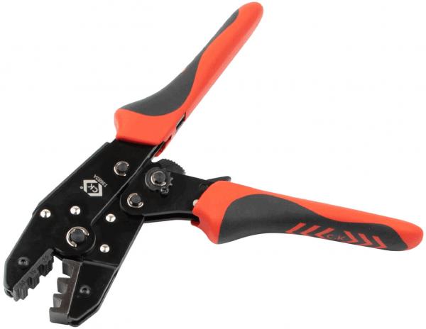 The image shows a crimping tool with black and reddish handles. The tool has various notches on the head for processing cables and connectors. It is robust and ergonomically designed.