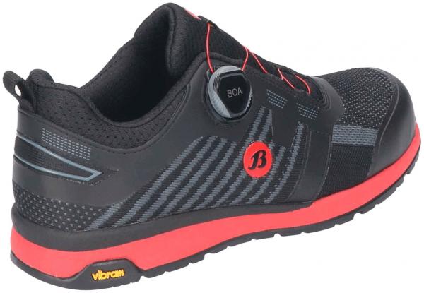 The shoe is black with red accents. It features a modern design and a special lacing technology (BOA). The sole is marked in yellow and ensures good grip.