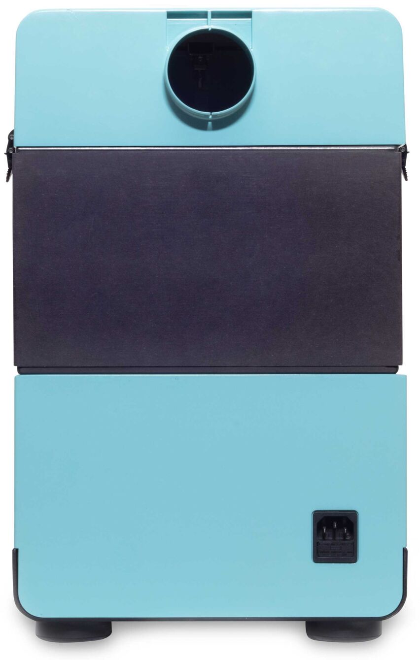 The image displays a device in bright blue with a black front. At the top, there is a circular opening. A connector is visible on the bottom right. The design is modern and compact.