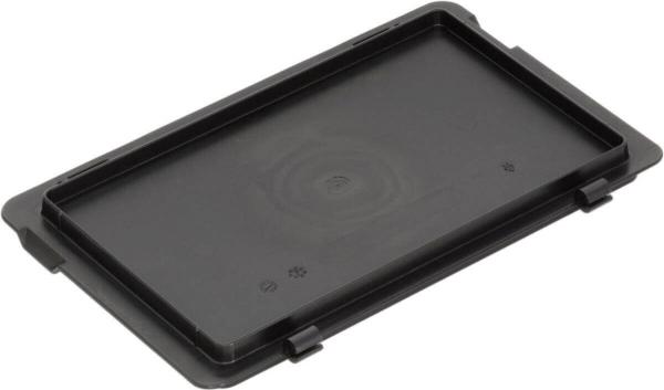 The image shows a rectangular, flat black plastic plate. It has slightly raised edges and is situated on a flat surface. There are no distinct patterns or texts visible.