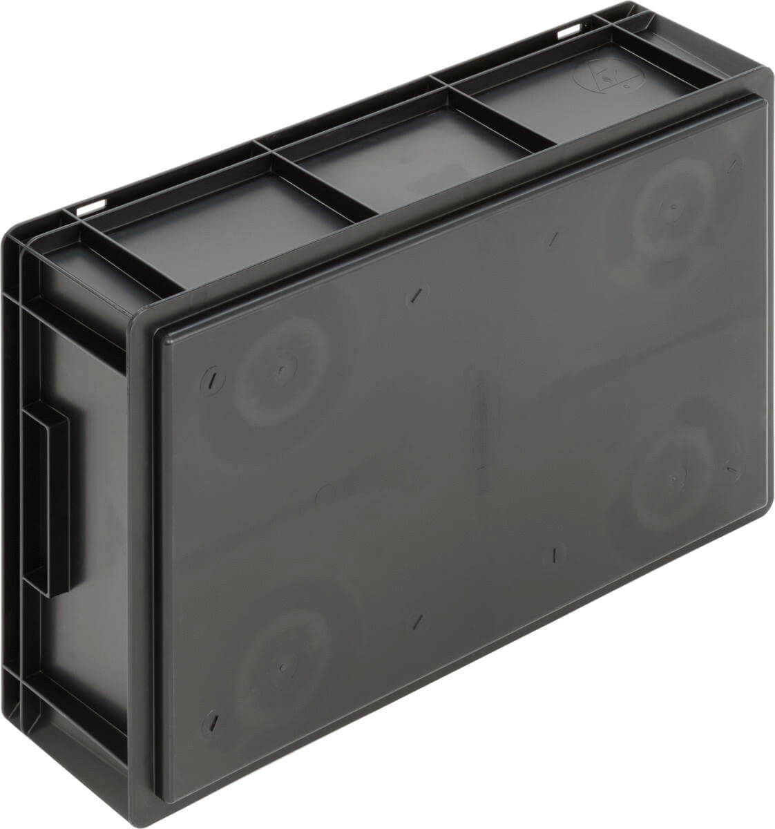 The image shows a rectangular, black plastic box with round indentations on the bottom. The top has several compartments, and the corners are rounded.